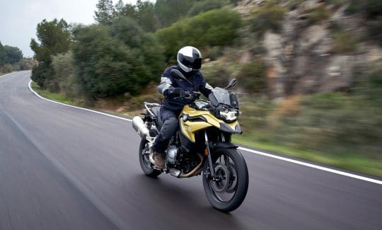 BMW F 750 GS in motion on a mountain highway
