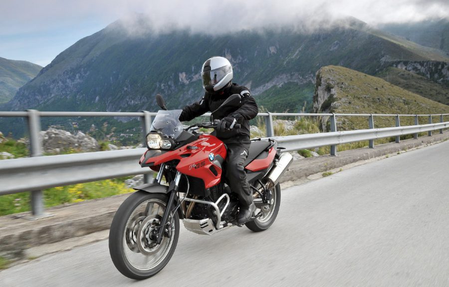 BMW F700GS on a mountainside highway