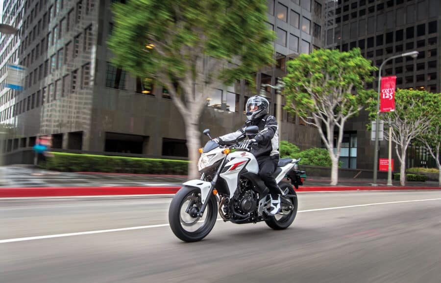 Honda CB 500 F riding through city streets