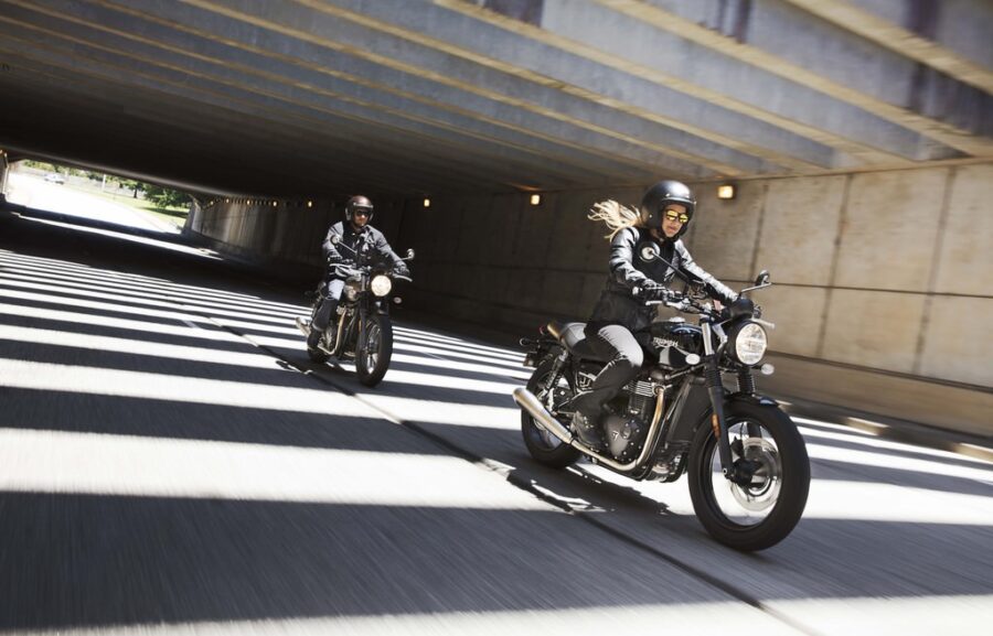 Triumph Street Twin in the city racing through an underpass