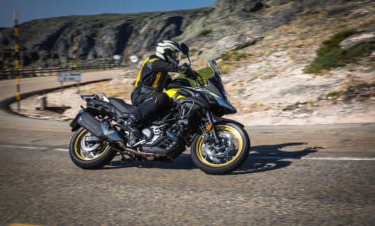 Suzuki V-Strom 650 leaning into a mountain road