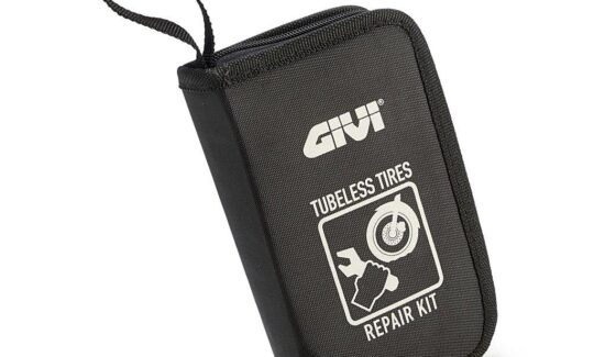 a black pouch containing a motorcycle tire puncture repair kit.