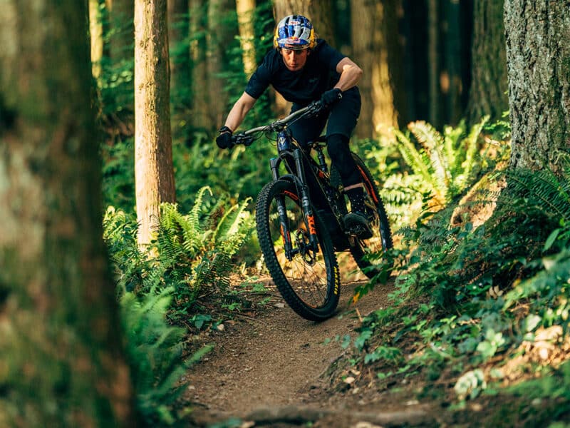 riding an electric mountain bike downhill on the northshore