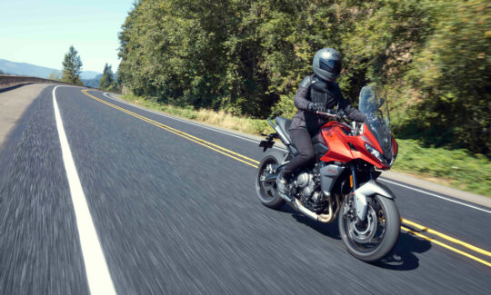 Tiger sport 660 going fast on a forest road