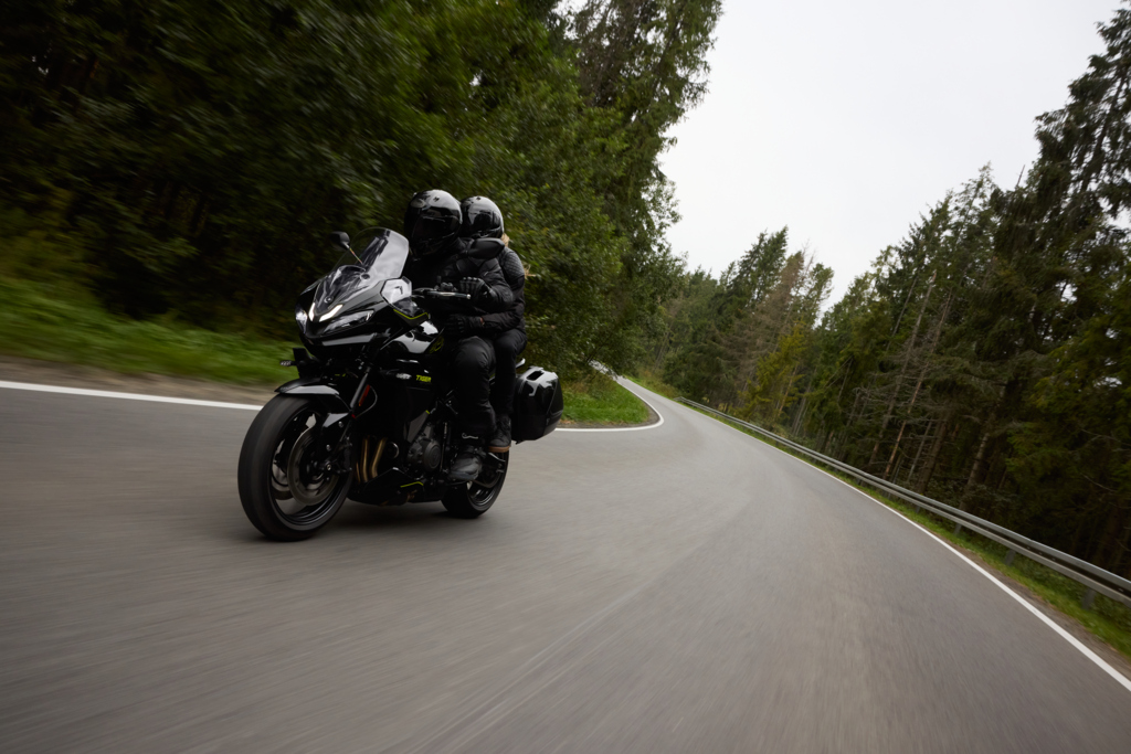 A couple on a Tigersport in the forest