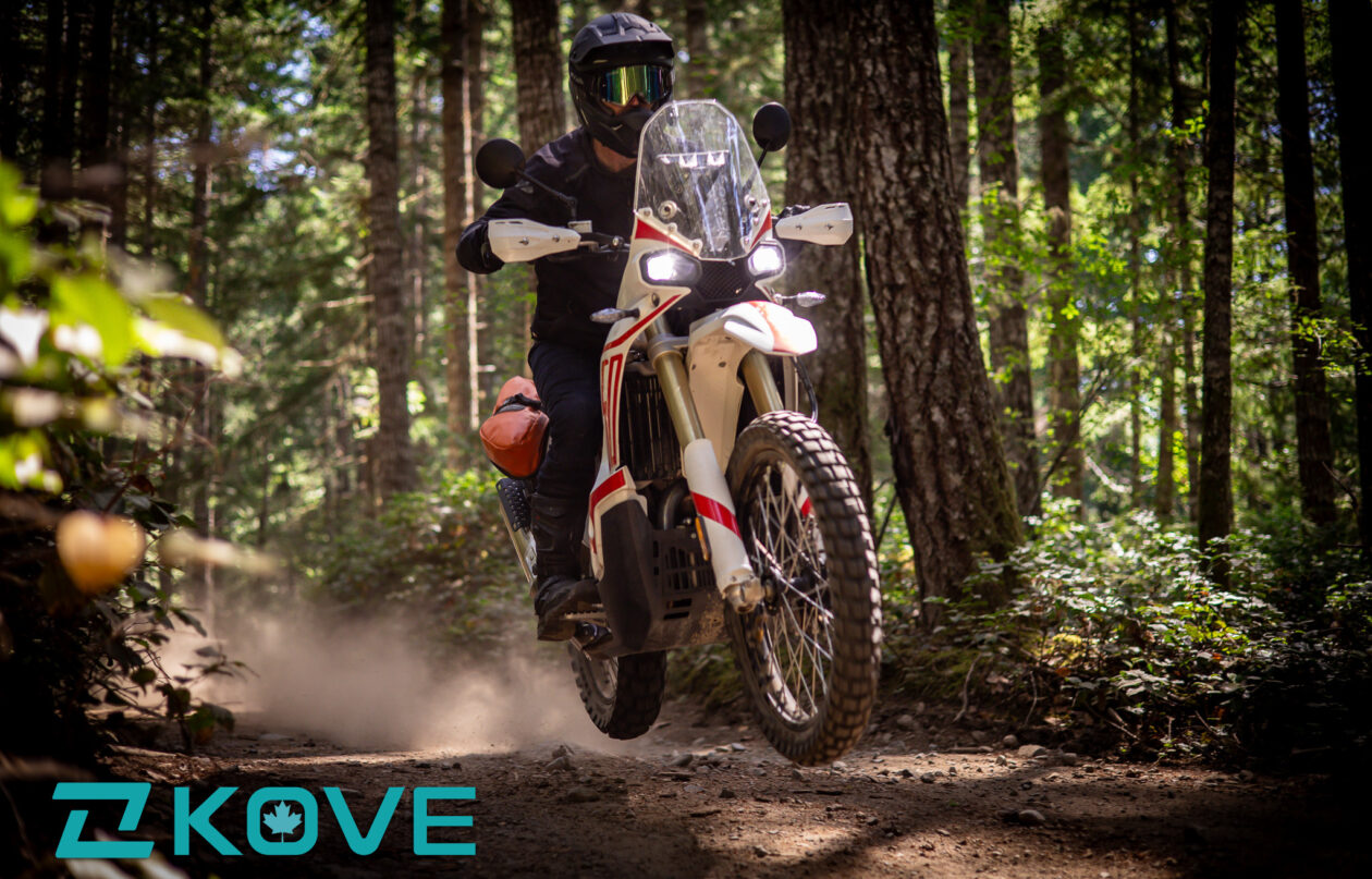 A kove 450 Rally jumping in the forest