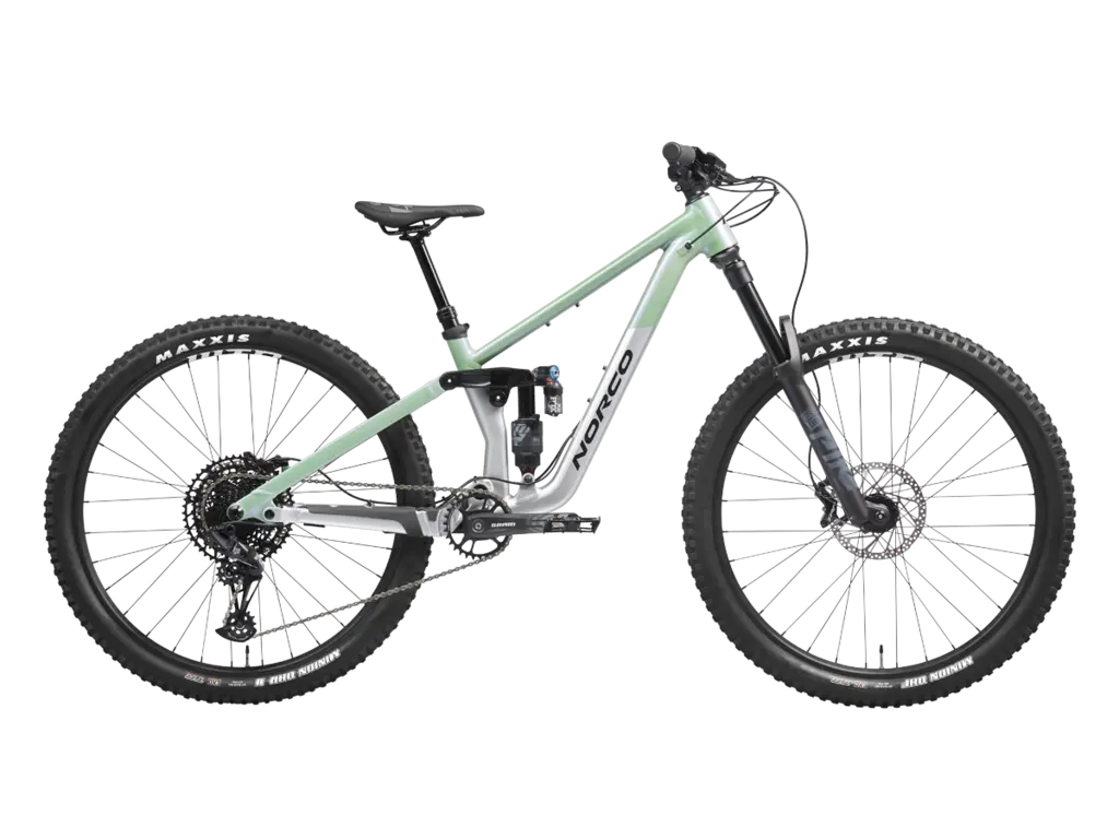 Green mountain bike with full suspension